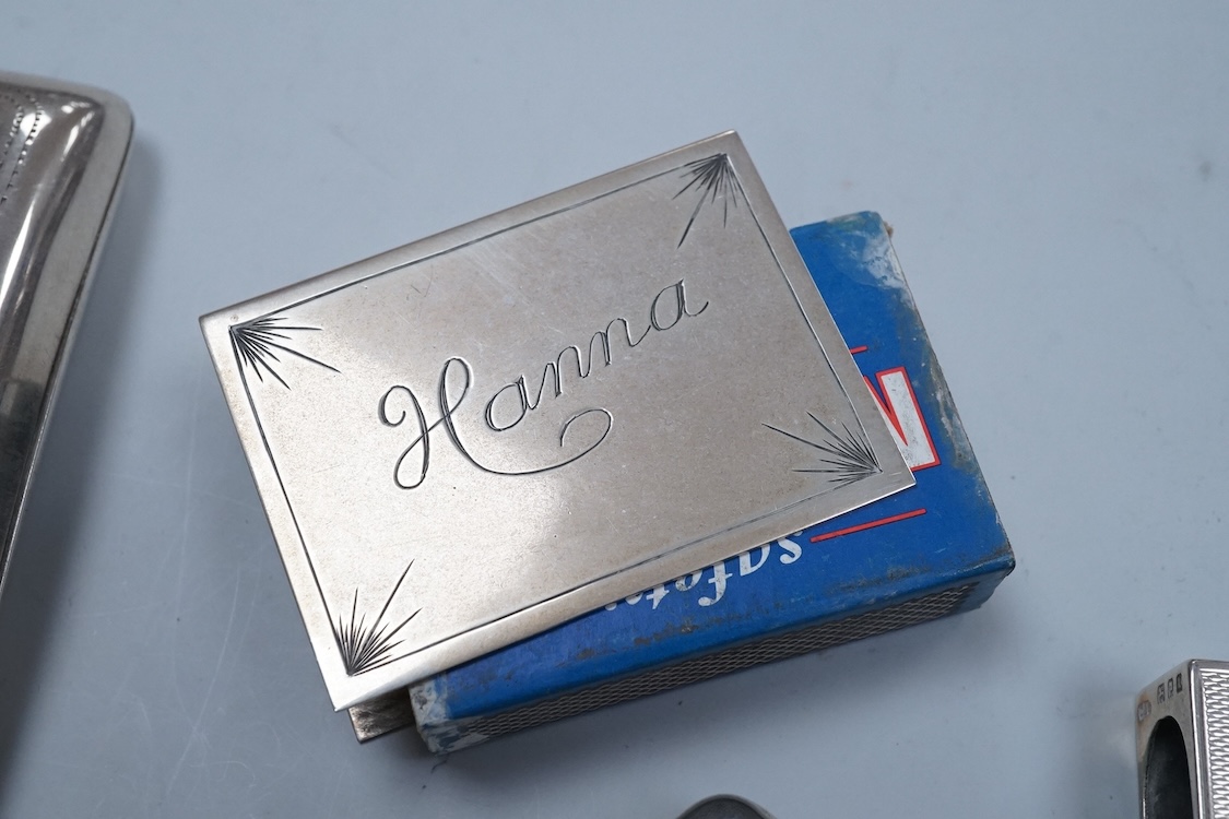 A George V engraved silver cigarette case, Birmingham, 1930, 82mm, a similar silver vesta case, London, 1913 and two silver matchbox sleeves.